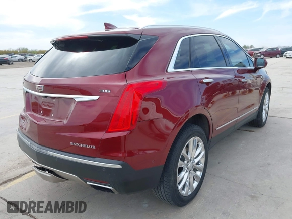 2017 Cadillac XT5 Platinum AWD with VIN 1GYKNFRS9HZ126747, listed as a IAAI auction lot 41810902 with 106,507 mi miles. Bid and sale history available at carsss.com. Image 4.