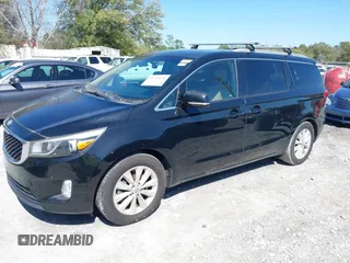 2017 Kia Sedona EX with VIN KNDMC5C13H6263232, listed as a IAAI auction lot 41733170 with 102,026 mi miles. Bid and sale history available at carsss.com. Image 2.