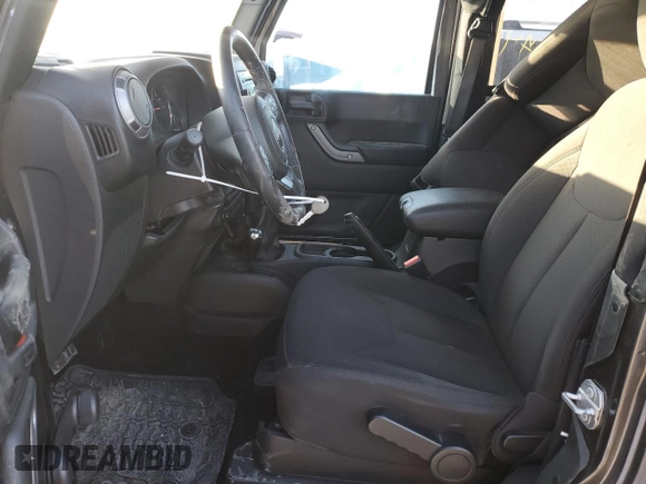 2017 Jeep Wrangler Willys Wheeler with VIN 1C4AJWAG2HL638213, listed as a Copart auction lot 88121675 with 62,760 mi miles and Salvage Title. Bid and sale history available at DreamBid. Image 7.