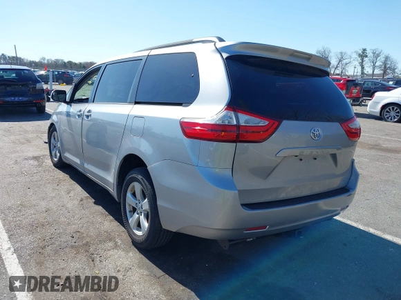 2015 Toyota Sienna LE AAS with VIN 5TDKK3DC0FS663826, listed as a IAAI auction lot 42050229 with 126,971 mi miles and . Bid and sale history available at DreamBid. Image 3.