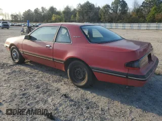1988 Ford Thunderbird with VIN 1FABP6041JH103866, listed as a Copart auction lot 51694165 with 94,935 mi miles and Salvage Title. Bid and sale history available at carsss.com. Image 2.