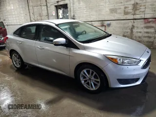 2017 Ford Focus SE with VIN 1FADP3F29HL223970, listed as a Copart auction lot 66022345 with 104,601 mi miles and Clean title. Bid and sale history available at DreamBid. Image 4.