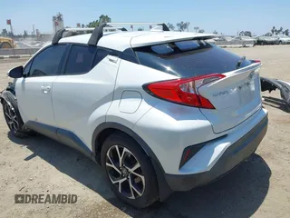 2018 Toyota C-HR XLE with VIN NMTKHMBX8JR036857, listed as a IAAI auction lot 42667018 with 63,058 mi miles and . Bid and sale history available at DreamBid. Image 3.