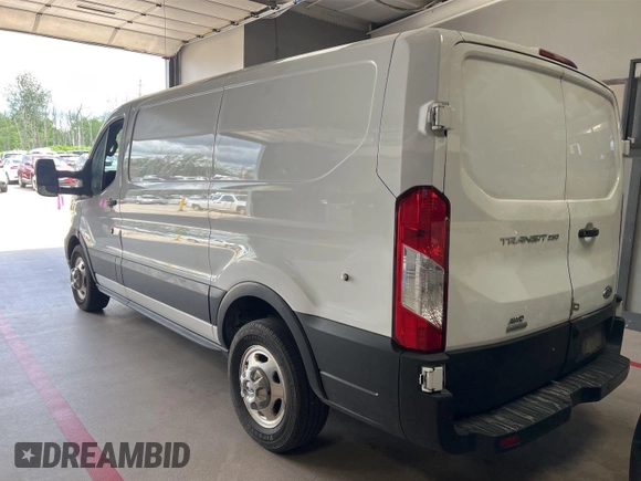 2020 Ford Transit Cargo z VIN 1FTBR2YG5LKA32432, wystawiony jako IAAI lot #42493895 z przebiegiem 134 672 mil mil oraz . Historia ofert i sprzedaży dostępna na DreamBid. Obrazek 16.