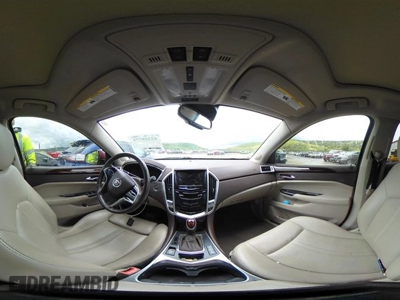 2014 Cadillac SRX Performance Collection z VIN 3GYFNCE30ES596415, wystawiony jako IAAI lot #42329771 z przebiegiem 71 620 mil mil oraz . Historia ofert i sprzedaży dostępna na DreamBid. Obrazek 18.