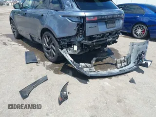 2020 Land Rover Range Rover Velar z VIN SALYU2EE1LA258140, wystawiony jako IAAI lot #42326439 z przebiegiem 61 827 mil mil oraz . Historia ofert i sprzedaży dostępna na DreamBid. Obrazek 6.