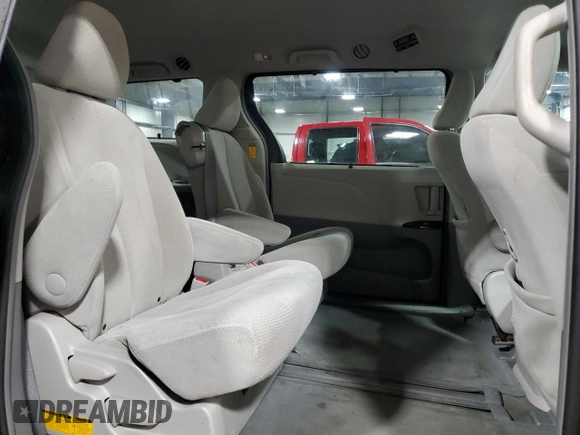 2014 Toyota Sienna LE AAS z VIN 5TDKK3DC0ES432309, wystawiony jako Copart lot #54094805 z przebiegiem 139 342 mil mil oraz Szkoda całkowita • Salvage title. Historia ofert i sprzedaży dostępna na DreamBid. Obrazek 11.