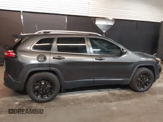 2016 Jeep Cherokee Latitude with VIN 1C4PJMCS4GW360475, listed as a IAAI auction lot 41479053 with 154,554 mi miles. Bid and sale history available at carsss.com. Image 14.