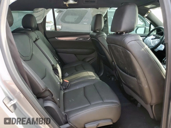 2024 Cadillac XT6 FWD Luxury with VIN 1GYKPAR41RZ700452, listed as a Copart auction lot 57675945 with 27,449 mi miles and Salvage title. Bid and sale history available at DreamBid. Image 11.