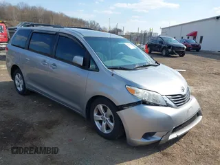 2014 Toyota Sienna LE AAS with VIN 5TDKK3DC9ES454227, listed as a IAAI auction lot 42030131 with 107,392 mi miles and . Bid and sale history available at carsss.com. Image 1.