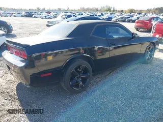 2014 Dodge Challenger R/T Plus z VIN 2C3CDYBT2EH274265, wystawiony jako IAAI lot #41845052 z przebiegiem 120 290 mil mil oraz . Historia ofert i sprzedaży dostępna na DreamBid. Obrazek 4.