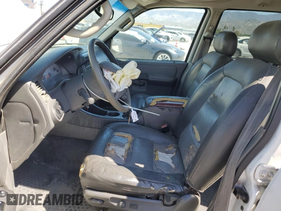 2005 Ford Explorer Sport Trac XLS z VIN 1FMZU67K05UA88775, wystawiony jako Copart lot #57905085 z przebiegiem 303 258 mil mil oraz Szkoda całkowita • Salvage title. Historia ofert i sprzedaży dostępna na DreamBid. Obrazek 7.
