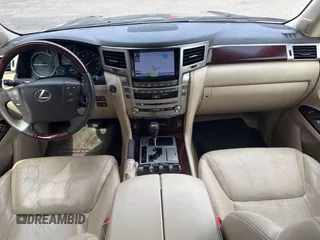 2013 Lexus LX 570 with VIN JTJHY7AX9D4126420, listed as a IAAI auction lot 41794133 with 156,035 mi miles and . Bid and sale history available at DreamBid. Image 6.