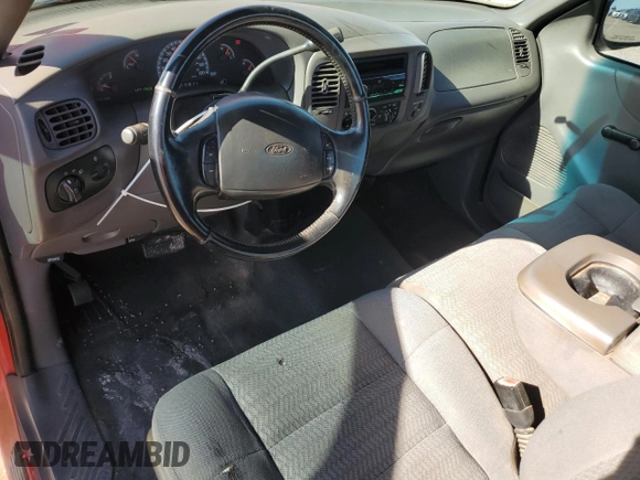 2001 Ford F-150 XL with VIN 1FTZX17211NB16120, listed as a Copart auction lot 54884765 with 124,196 mi miles and Salvage title. Bid and sale history available at DreamBid. Image 8.