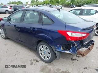 2012 Ford Focus SE with VIN 1FAHP3F21CL163449, listed as a IAAI auction lot 42296901 with 229,857 mi miles and . Bid and sale history available at DreamBid. Image 3.