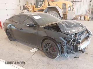 2016 Nissan Maxima SL z VIN 1N4AA6AP6GC393291, wystawiony jako IAAI lot #42104381 z przebiegiem 88 154 mil mil oraz . Historia ofert i sprzedaży dostępna na DreamBid. Obrazek 1.