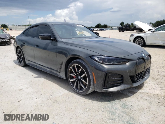 2023 BMW i4 eDrive40 with VIN WBY73AW00PFN90032, listed as a Copart auction lot 59993324 with 15,913 mi miles and Non Repairable. Bid and sale history available at carsss.com. Image 4.