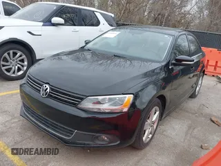 2012 Volkswagen Jetta TDI w/Premium with VIN 3VWLL7AJ9CM367840, listed as a IAAI auction lot 41868444 with 176,486 mi miles and . Bid and sale history available at DreamBid. Image 2.