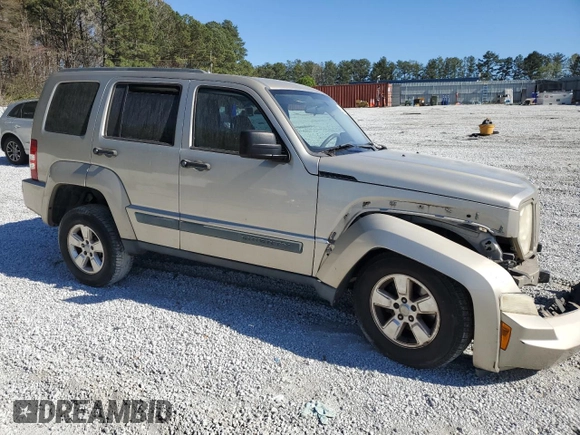 2010 Jeep Liberty Sport with VIN 1J4PP2GK9AW128825, listed as a Copart auction lot 48113835 with 258,730 mi miles and Salvage Title. Bid and sale history available at DreamBid. Image 4.