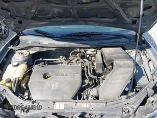 2006 Mazda 3 i with VIN JM1BK12F461530369, listed as a IAAI auction lot 41990008 with 169,878 mi miles. Bid and sale history available at carsss.com. Image 10.