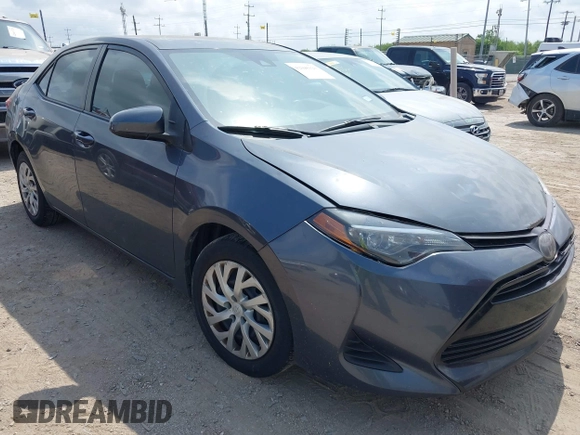 2019 Toyota Corolla L z VIN 5YFBURHE7KP948955, wystawiony jako IAAI lot #42046123 z przebiegiem 98 352 mil mil oraz . Historia ofert i sprzedaży dostępna na DreamBid. Obrazek 1.