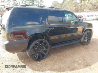 2007 Chevrolet Tahoe LTZ with VIN 1GNFC13J57R353424, listed as a IAAI auction lot 41766036 with 238,272 mi miles and . Bid and sale history available at DreamBid. Image 4.