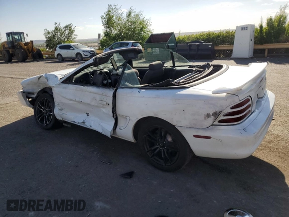 1994 Ford Mustang with VIN 1FALP45T8RF205391, listed as a Copart auction lot 54699065 with 167,335 mi miles and Salvage title. Bid and sale history available at DreamBid. Image 2.