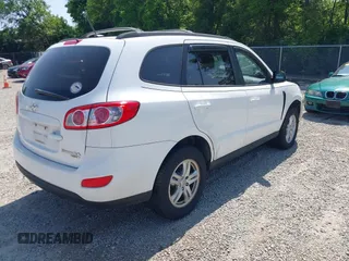 2010 Hyundai Santa Fe GLS z VIN 5NMSGDAB3AH363860, wystawiony jako IAAI lot #42412022 z przebiegiem 171 527 mil mil oraz . Historia ofert i sprzedaży dostępna na DreamBid. Obrazek 4.