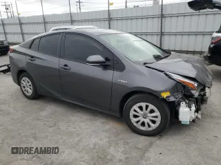 2021 Toyota Prius L Eco with VIN JTDKAMFU8M3130779, listed as a Copart auction lot 56452395 with 86,094 mi miles and Salvage title. Bid and sale history available at DreamBid. Image 4.