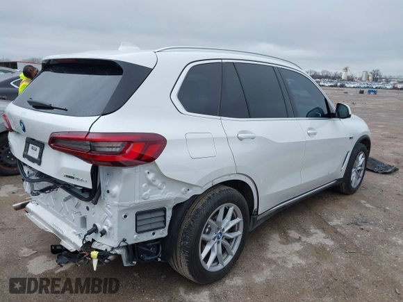 2023 BMW X5 xDrive45e with VIN 5UXTA6C02P9R94549, listed as a IAAI auction lot 41534725 with 8,698 mi miles. Bid and sale history available at carsss.com. Image 4.