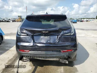 2022 Cadillac XT4 FWD Sport with VIN 1GYFZER46NF119009, listed as a Copart auction lot 57651725 with 37,896 mi miles and Salvage title. Bid and sale history available at DreamBid. Image 6.