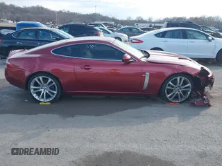 2008 Jaguar XK with VIN SAJWA43C089B22700, listed as a IAAI auction lot 41585734 with 67,946 mi miles. Bid and sale history available at carsss.com. Image 13.