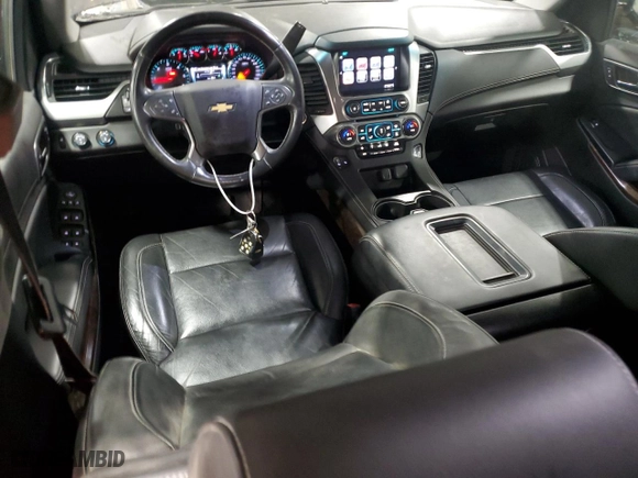 2015 Chevrolet Tahoe LT with VIN 1GNSKBKCXFR126500, listed as a Copart auction lot 49814255 with 106,714 mi miles and Salvage Title. Bid and sale history available at carsss.com. Image 8.