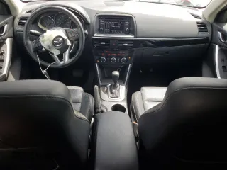 2014 Mazda CX-5 Grand Touring with VIN JM3KE4DY9E0416967, listed as a Copart auction lot 54215285 with 77,296 mi miles and Salvage Title. Bid and sale history available at DreamBid. Image 8.