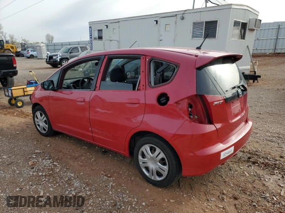 2009 Honda Fit with VIN JHMGE882X9S014265, listed as a Copart auction lot 51140695 with 130,809 mi miles and Salvage Title. Bid and sale history available at carsss.com. Image 2.