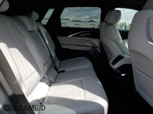 2024 Cadillac LYRIQ Luxury z VIN 1GYKPRRK6RZ104038, wystawiony jako Copart lot #51623145 z przebiegiem Nie podano mil oraz Szkoda całkowita • Salvage title. Historia ofert i sprzedaży dostępna na DreamBid. Obrazek 11.