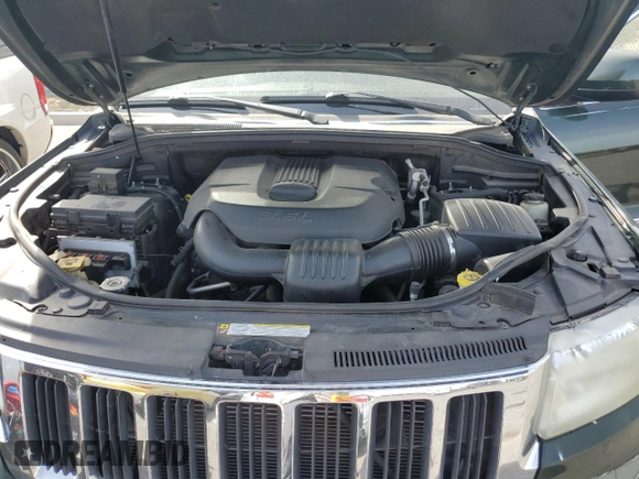 2011 Jeep Grand Cherokee Laredo with VIN 1J4RR4GG2BC636423, listed as a Copart auction lot 51169135 with 143,058 mi miles and Salvage Title. Bid and sale history available at DreamBid. Image 12.