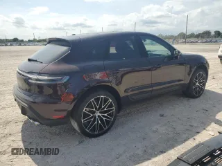2024 Porsche Macan with VIN WP1AA2A53RLB14849, listed as a Copart auction lot 57979155 with 10,031 mi miles and Salvage title. Bid and sale history available at DreamBid. Image 3.