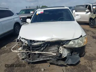 2001 Toyota Avalon XL z VIN 4T1BF28B71U166532, wystawiony jako IAAI lot #42149996 z przebiegiem 172 698 mil mil oraz . Historia ofert i sprzedaży dostępna na DreamBid. Obrazek 11.