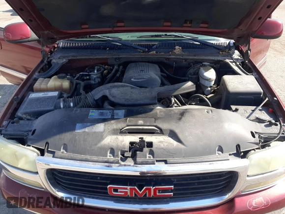 2003 GMC Yukon SLT with VIN 1GKEC13V43J171962, listed as a Copart auction lot 63244534 with 200,159 mi miles and Salvage Title. Bid and sale history available at carsss.com. Image 12.
