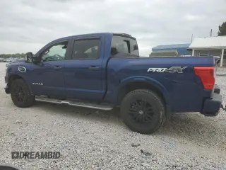 2017 Nissan Titan Pro-4X with VIN 1N6AA1E53HN570548, listed as a Copart auction lot 71663224 with 128,024 mi miles and Salvage title. Bid and sale history available at DreamBid. Image 2.