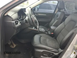 2020 Mazda CX-5 Touring z VIN JM3KFBCM2L0750223, wystawiony jako Copart lot #56300415 z przebiegiem 87 392 mil mil oraz Szkoda całkowita • Salvage title. Historia ofert i sprzedaży dostępna na DreamBid. Obrazek 7.