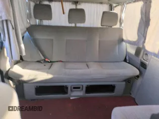 2003 Volkswagen EuroVan MV с VIN WV2NB47083H002700, выставлен на аукционе Copart как лот 76117874 с пробегом 186 942 миль миль и На запчасти • Non repairable. История ставок и продаж доступна на DreamBid. Изображение 10.