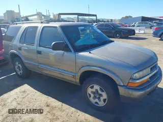 2002 Chevrolet Blazer LS z VIN 1GNDT13W52K213071, wystawiony jako IAAI lot #41336010 z przebiegiem 157 758 mil mil oraz . Historia ofert i sprzedaży dostępna na DreamBid. Obrazek 1.