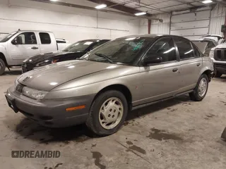 1997 Saturn SL with VIN 1G8ZH5280VZ172929, listed as a IAAI auction lot 41273214 with 134,972 mi miles. Bid and sale history available at carsss.com. Image 20.
