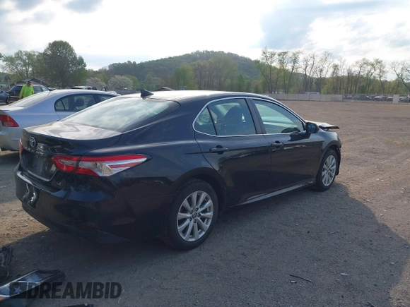 2020 Toyota Camry LE with VIN 4T1C11AK2LU393699, listed as a IAAI auction lot 42123267 with 66,932 mi miles and . Bid and sale history available at carsss.com. Image 4.
