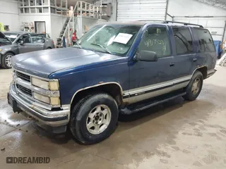 1997 Chevrolet Tahoe with VIN 1GNEK13RXVJ386600, listed as a IAAI auction lot 41917523 with 286,395 mi miles. Bid and sale history available at carsss.com. Image 2.
