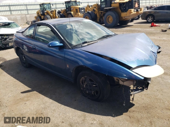 2001 Saturn SC z VIN 1G8ZR12731Z256766, wystawiony jako Copart lot #70595904 z przebiegiem Nie podano mil oraz Szkoda całkowita • Salvage title. Historia ofert i sprzedaży dostępna na DreamBid. Obrazek 4.