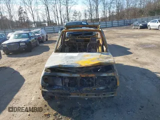 1996 Chevrolet Tracker z VIN 2CNBJ1869T6914128, wystawiony jako IAAI lot #41399004 z przebiegiem Nie podano mil oraz . Historia ofert i sprzedaży dostępna na DreamBid. Obrazek 6.