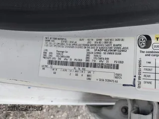 2019 Ford Fiesta SE z VIN 3FADP4EJ5KM132862, wystawiony jako IAAI lot #40893430 z przebiegiem 91 011 mil mil oraz . Historia ofert i sprzedaży dostępna na DreamBid. Obrazek 9.